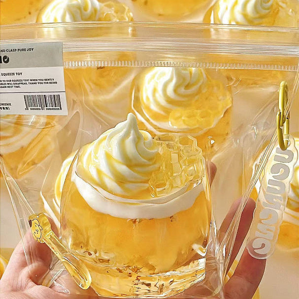 honey dessert cup squishy toy with pastel yellow design, cute stress relief collectible