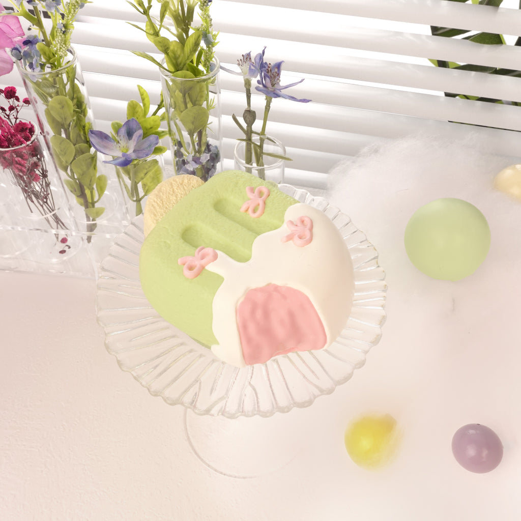 cute melon squishy toy with ribbon design, pastel green, soft stress relief